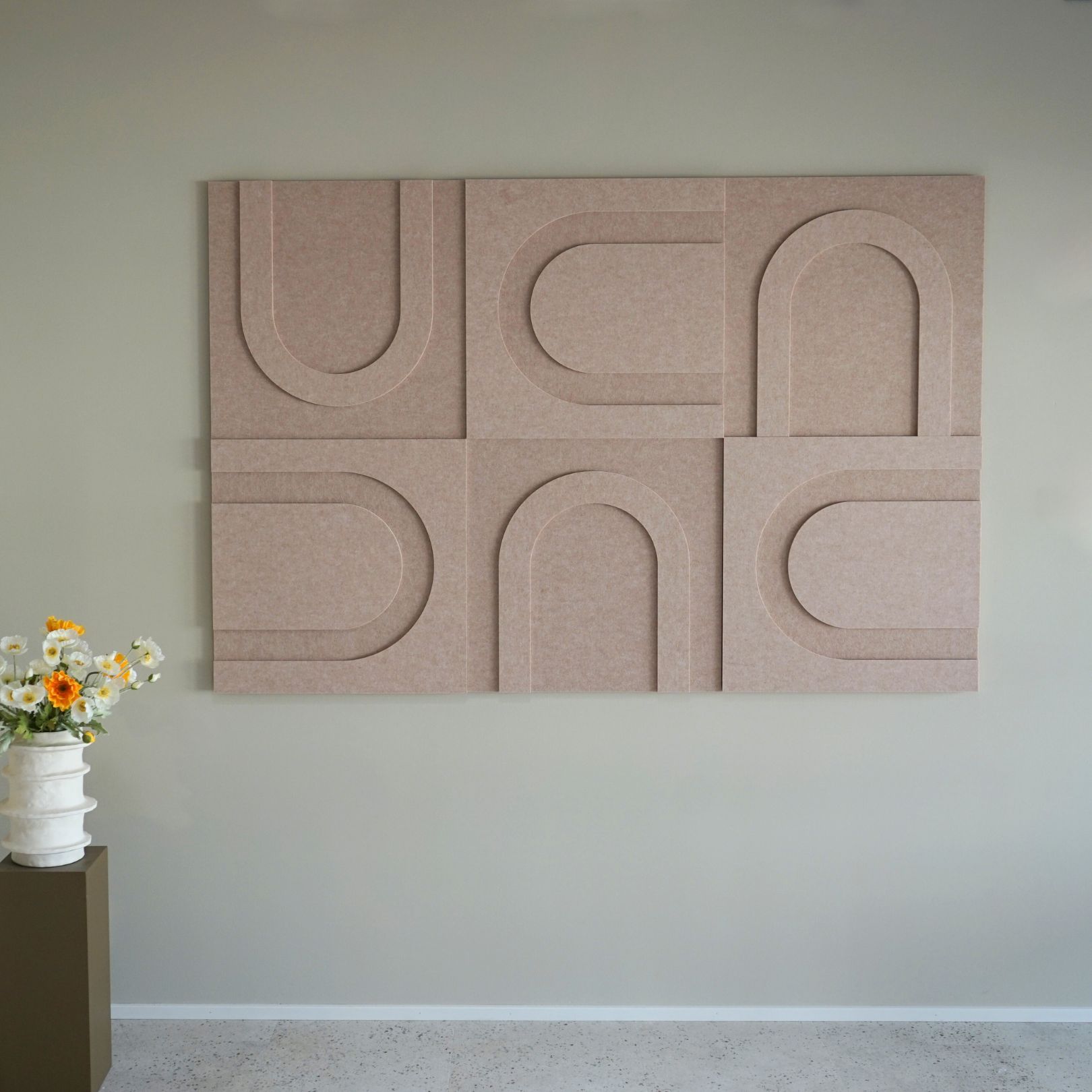 Geometric acoustic art panels in beige from Arturel's collection, designed for sound absorption and modern interior decor.